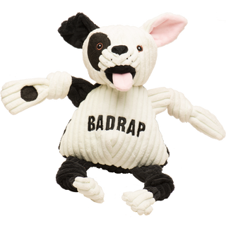 Jonny Justice durable plush corduroy dog toy: the dog has white and black fur, white left ear, black right ear, black right outer-eye, with brown eyes, white pupils, a plush-out black nose, and mouth. has a black and white furred right arm, the word "BadRap" across the chest, black furred legs, white paws, and is squeaky with knotted limbs. 