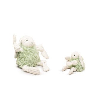 Set of two bunny shaped durable plush dog toys in large and small with white corduroy knotted limbs, white corduroy head, light green faux-fur body, long white corduroy ears with light green inner ears, light green embroidered nose and black embroidered eyes..