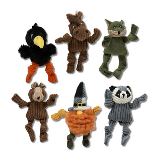 Set of six tiny corduroy plush dog toys designed for toy-sized dogs: black crow, brown horse, olive green fox, brown squirrel, multicolored gnome, and gray raccoon.