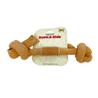 HuggleHide Naturals tanned water buffalo knotted bone in size large on packaging.