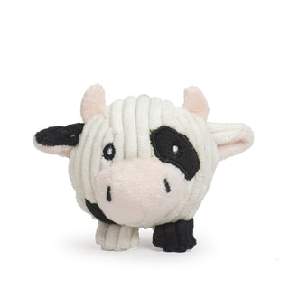 White cow tiny plush corduroy dog toy with black spots, black right ear, black left eye, and a black front left foot.