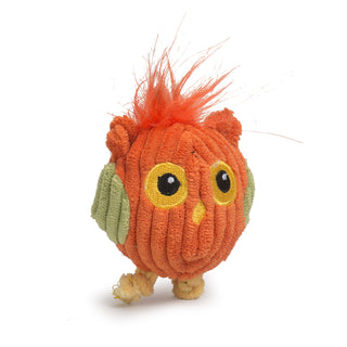 Side view of owl tiny plush corduroy ball dog toy with orange body and hair, lime green wings, and yellow feet and eyes.