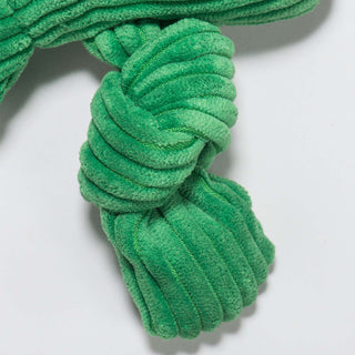 Close-up of knotted green limb.
