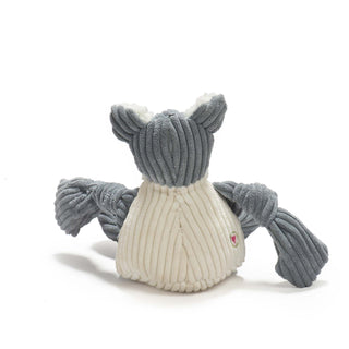 Back view of dog durable plush corduroy dog toy with gray knotted limbs and white body.