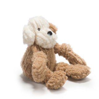 Side view of mutt inspired fuzzy plush corduroy dog with tan body, one tan ear, tan knotted limbs, white head, one white ear, black nose and black and brown embroidered eyes.