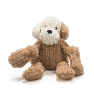 Mutt inspired fuzzy plush corduroy dog with tan body, one tan ear, tan knotted limbs, white head, one white ear, black nose and black and brown embroidered eyes.