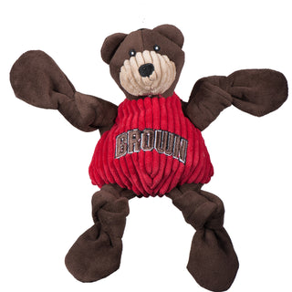 Brown University Bruno the bear durable plush corduroy dog toy with brown knotted limbs, brown head, tan face, and a red shirt with the University logo on chest. Size small