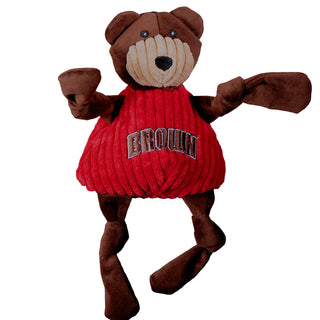 Brown University Bruno the bear durable plush corduroy dog toy with brown knotted limbs, brown head, tan face, and a red shirt with the University logo on chest. Size large