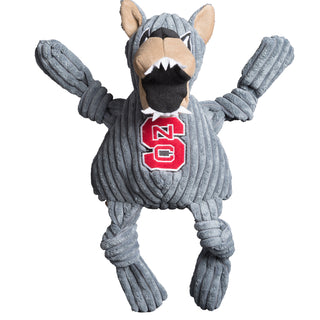North Carolina State University Mr. Wuf mascot durable corduroy plush dog toy with grey body, head, and knotted limbs, tan muzzle and inner ears, wide open black mouth with pointy white teeth, embroidered black and white eyes, and embroidered university logo on chest. Size large.