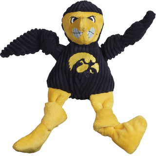 University of Iowa Herky the Hawk corduroy plush dog toy: has navy blue fur, yellow furred face, black eyes, white pupils, plush-out yellow beak, white teeth, navy blue furred body, arms and furred legs, and is squeaky with knotted limbs. 