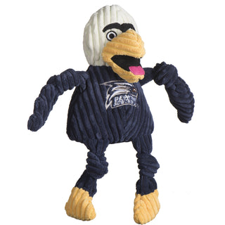 Georgia Southern University Gus the eagle plush dog toy: has white head, black unibrow, white eyes, black pupils, yellow beak, black mouth with a pink tongue, the body arms and legs are navy blue, navy blue shirt has the university logo on it, has yellow feet, and is squeaky with knotted limbs. Size large.