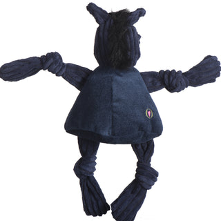 Back of University of California Davis durable plush dog toy, with navy blue knotted limbs, navy blue head, black hair, and wearing a navy blue shirt with the HuggleHeart logo on the bottom right.