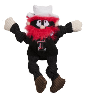 Texas Tech University Raider Red mascot durable plush dog toy with off-white hands and ears, shaggy red hair and beard, white top hat, bandit mask, brown shoes, and black corduroy knotted arms, legs, and shirt with University logo on front chest. Size small.