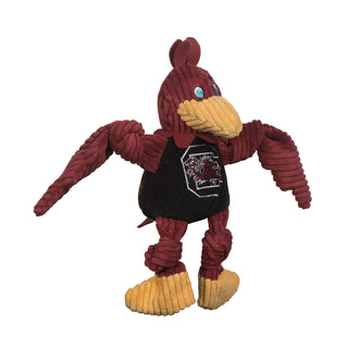 University of South Carolina, Cocky mascot durable plush corduroy dog toy with burgundy head, burgundy knotted wings and legs, blue eyes, yellow beak and feet, black shirt with university logo across the chest. Small size.