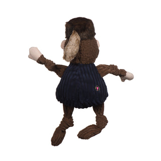 Back of West Virginia University Mountaineer mascot durable plush corduroy dog toy with knotted limbs, brown sleeves, legs, and hair, brown fur hat with tail in back, and navy shirt. Size large.