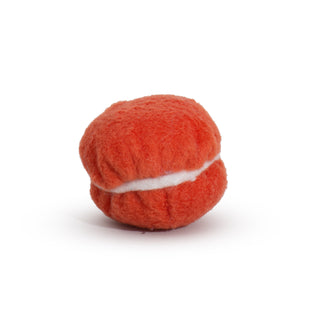 Orange macaroon shaped cat toy with catnip and bells inside and white fabric "filling".