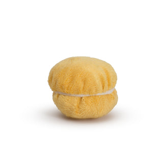 Yellow macaroon shaped cat toy with catnip and bells inside and white fabric "filling".
