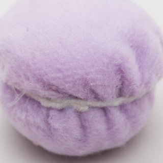 Close up of light purple ma-cat-a-roonie cat toy to show fabric texture.