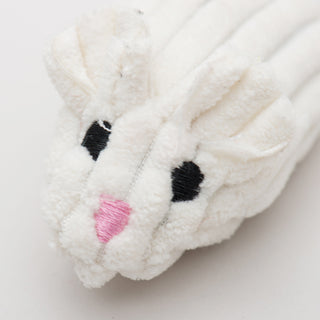 Close up of white mightie mouse cat toy to show detail in embroidered face and corduroy fabric.