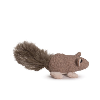 Side view of wee sized, squirrel shaped cat toy: has light-brown fur, black eyes, white pupils, light-beige inner-ear and feet, with a fluffy light-brown tail.