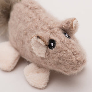 Close up image of wee Feller Squirrel cat toy to show embroidered eyes.