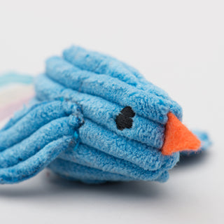 Close up image of blue chick to show corduroy and embroidery texture.