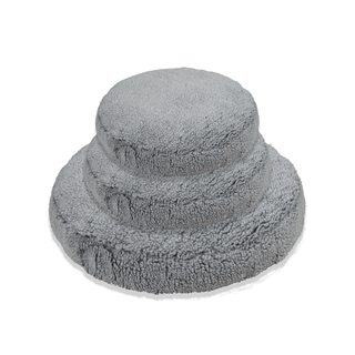 Set of three charcoal colored fluffy beds from largest to smallest in ascending order. 