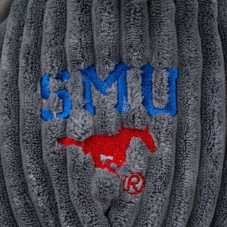 Close up view of embroidered university logo.